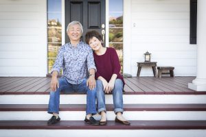 Senior couple sitting on porch
